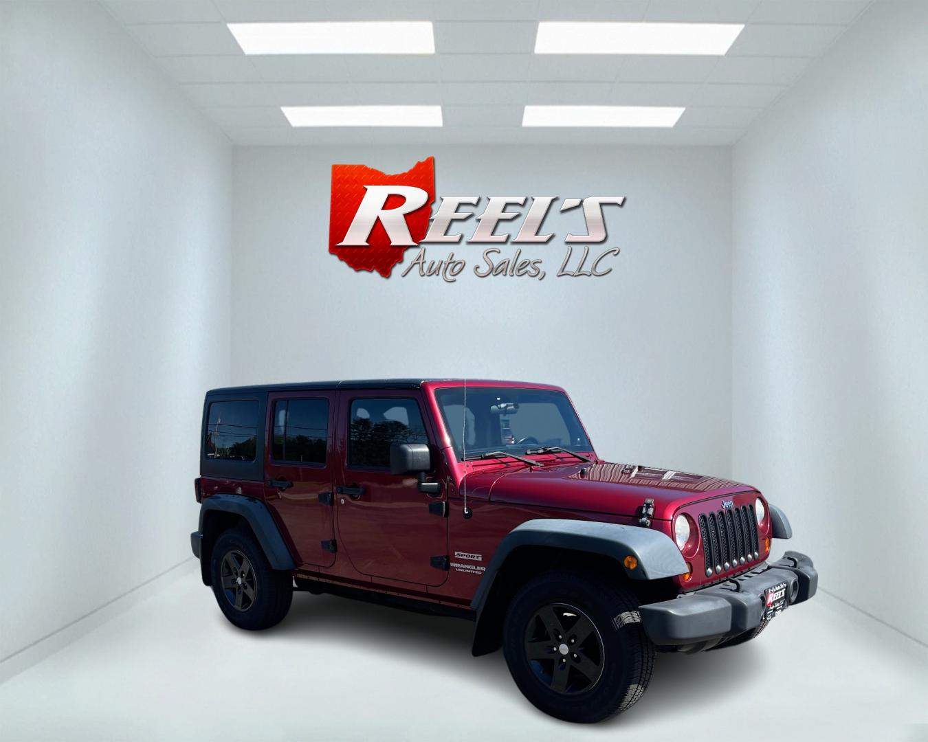 2012 Red /Black Jeep Wrangler Unlimited Sport 4WD (1C4BJWDG3CL) with an 3.6L V6 DOHC 24V engine, 5-Speed Automatic transmission, located at 547 E. Main St., Orwell, OH, 44076, (440) 437-5893, 41.535435, -80.847855 - This 2012 Jeep Wrangler Unlimited Sport with 4WD features a robust 3.6-liter Pentastar V6 engine paired with a 5-speed automatic transmission. It is equipped with a Dana 44 rear axle and a Dana 30 front axle, ensuring durable and reliable off-road capabilities. The model comes with a hardtop convert - Photo#3